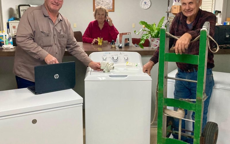 (From left)  Ronald Drozd, Lucille Drozd and Robert “Jack” Etzler pose in Gene’s Appliance Co.