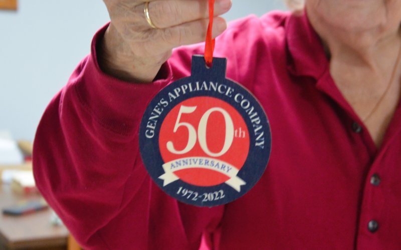 Gene’s staff will distribute commemorative ornaments for their 50th anniversary Dec. 1-2. Photo by Hans Lammeman