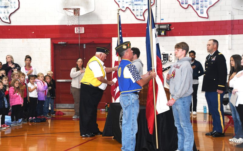 Members of Shiner VFW post the colors at the SCS Veteran’s Day program.