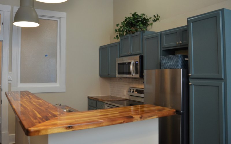 Several lofts on the second floor of the old National Bank building contain modern appliances and brand-new kitchens.