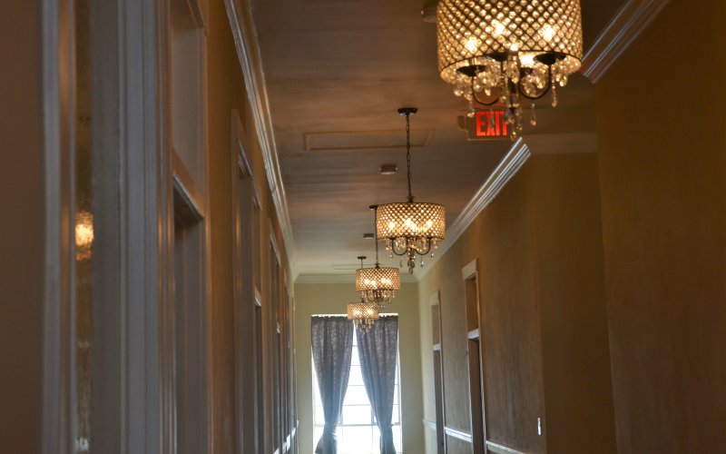Chandeliers line the hallway upstairs at the old National Bank building in downtown Yoakum.