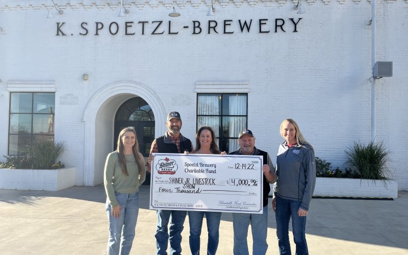 Pictured are, left to right, Charitable fund member Lauren Schuette, Shiner Junior Livestock show members Cody Crismon, Michelle Herman and Paul Koone, and Charitable fund member Julie Boehm. Contributed photo.