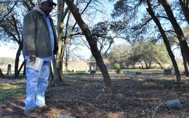 David Mitchell visits the grave of his great-grandmother Salle Mae Granger at the Yoakum City Colored Cemetery last Wednesday, Jan. 25.