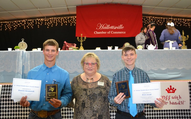 The 2022 Outstanding Senior Students were recognized at the 91st Annual Hallettsville Chamber of Commerce and Agriculture Banquet held Wednesday, Jan. 25. Selected from Hallettsville High School was Braxton Baranowski, while the Sacred Heart Catholic High School student was Brett Sestak. From left are Baranowski, CCA president Shirley Rothbauer and Sestak. Photo by Jimmy Appelt
