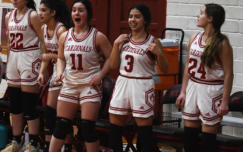 St. Paul players, from left, Alexa Escrobar, Petra Koch, Gracie Machart, Julia Barecky and Kara Tuch react to a second-half play during the Lady Cards’ playoff game against Conroe Covenant Christian on Feb. 10. Photo by Mark Lube.
