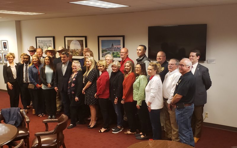 Most of Lavaca County's 40 gather for photo before splitting up once more to visit with various lawmakers.