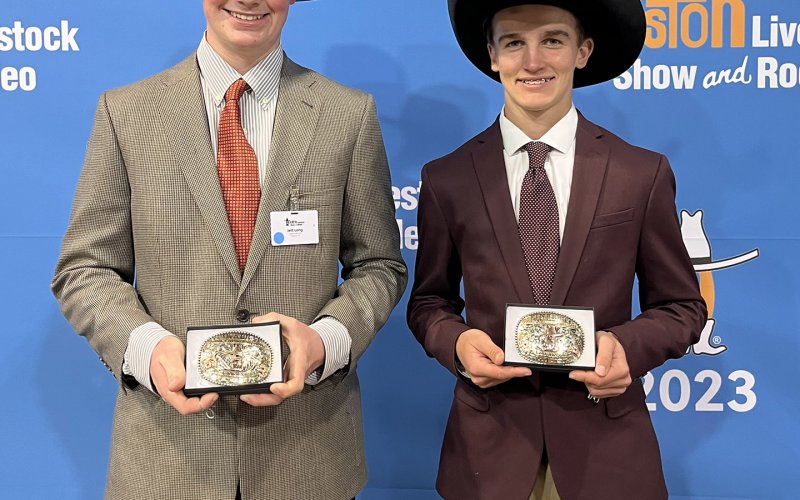Jett Long (left) and Jake Ressler, members of the Hallettsville Commercial Steer Program finished as Top 8 finalists at the Houston Livestock Show Commercial Steer Contest held on March 5-7. The two were presented a Top 8 Belt Buckle and a $1 thousand in prize money. Contributed Photo