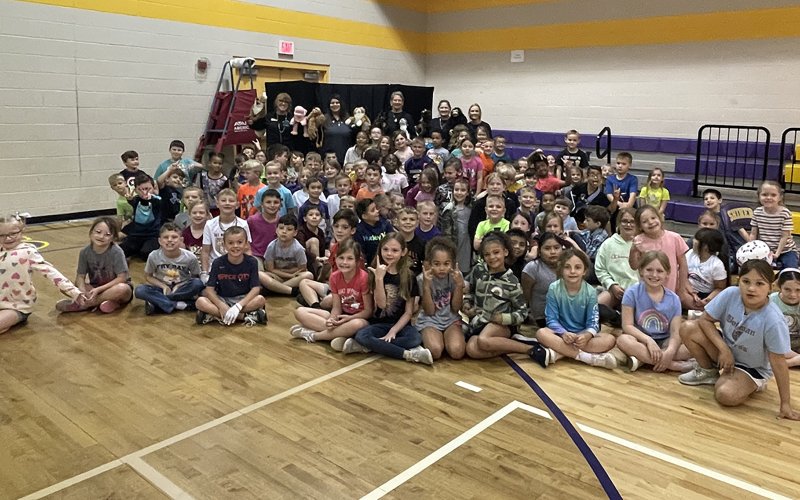 First and second grade students from Shiner Elementary with members of the Shiner Pilot Club.