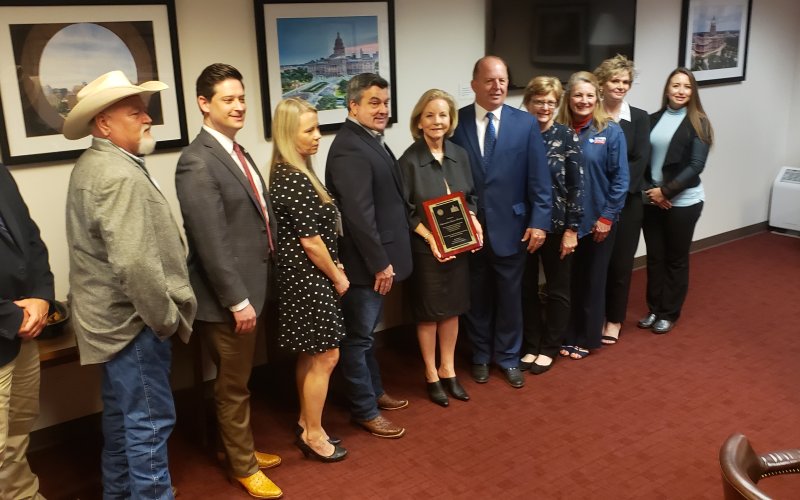 State Rep. Geanie Morrison also got a placard from her constituency in commemoration of Lavaca County Day at the Capitol.