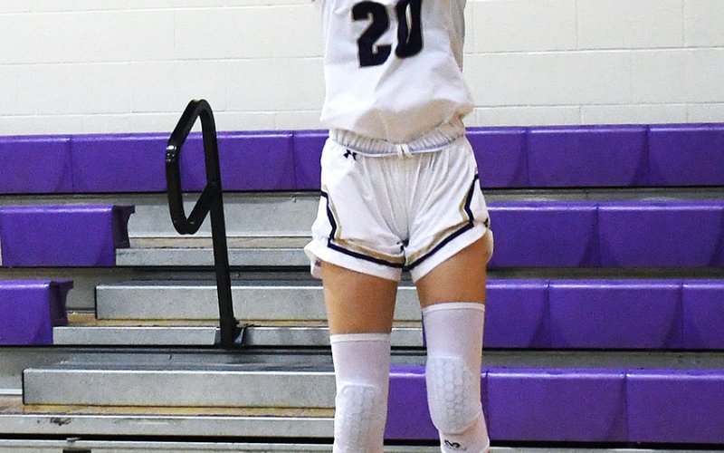Lenehan attempting a shot in the first half of the Lady Comanches’ home game at Bloomington back on January 24.Lenehan scored seven points and hit a triple in Shiner’s 32-12 district victory. Photo by Mark Lube.