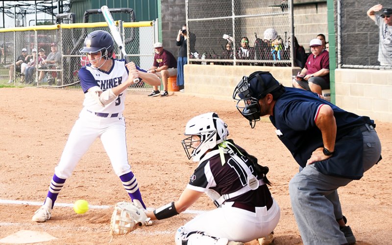 The Lady Comanches had enough hits at the plate at their two games last week in Louise and Bloomington to help them score 27 runs in both games. Photo by Mark Lube.