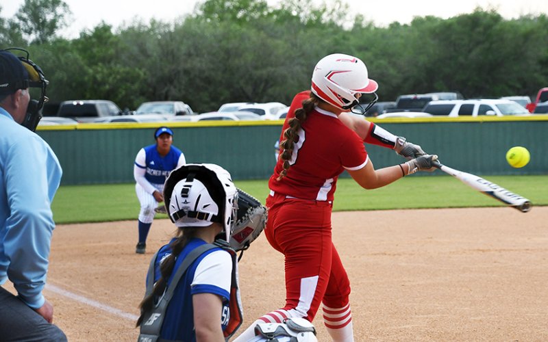 Tori Walker takes a swing at a pitch April 5 during St. Paul’s home game with Sacred Heart. Photo by Mark Lube.