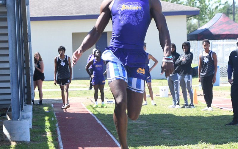 Dalton Brooks makes a jump during the long jump April 12 at the area-track meet in Weimar. He won the event as well as the 200-meter dash and was a part of the first place 400 and 800-relay teams. Photo by Mark Lube.