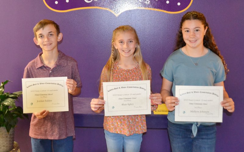 Lavaca Soil and Water Conservation District 13 and under essay winners from Shiner ISD are, left to right, Jordan Faldyn (1st), Blair Epley (2nd) and Mallory Johnson (3rd). Photo by Jimmy Appelt.