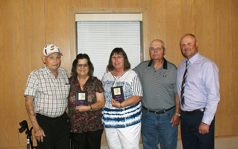 Shiner Booster Club Fans of the Year winners are from left Phill Stalls, Joan Stalls, Dagmar Vana and David Vana. Also shown is Shiner athletic director Daniel Boedeker. Photo by Mark Lube.