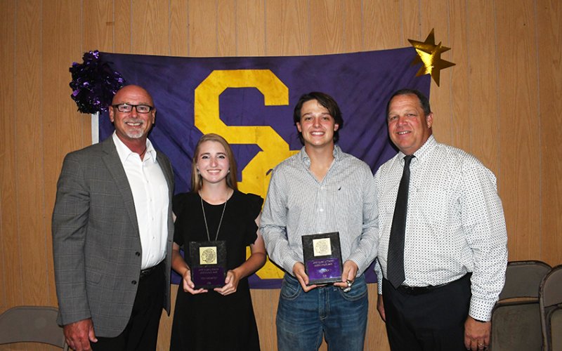 Johnny B.. Lewis Academic Award winners are Megan Winkenwerder (second from left) and Beck Bishop (second from right) along with Ray Neal (left) and John Peterson (right). Photo by Mark Lube.