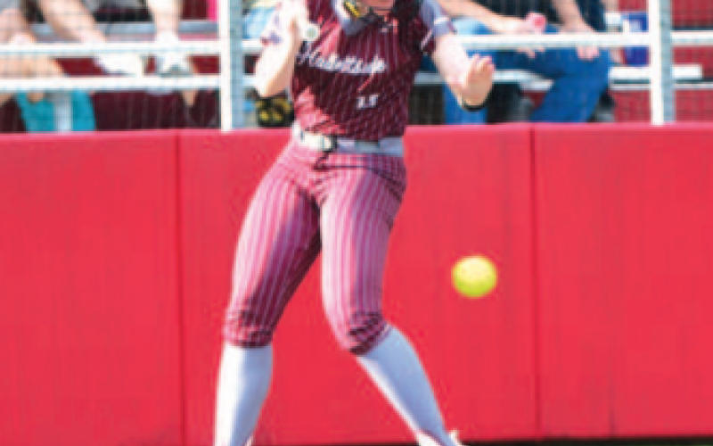 Katelyn Pustejovsky is hit by a pitch in the 5th inning of Game 1
