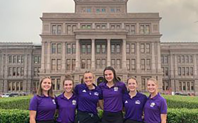 The Lady Comanches take a group photo in front of the Texas State Capitol Building. From left is Brianna Sofka, Lauren Faldyn, Chelsea Whidddon, Morgan Lenehan, Grace Migl and Megan Winkenwerder.Photo courtesy of Michelle Winkenwerder.