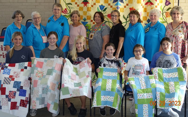 Seated, left to right, McKenzie Kessler, Madeline Collins, Hannah Machacek, Rena Pierce, Ana Lowe and Alma Lowe; standing, left to right, Irene Cerny, Mary Shafer, Bernadette Kresta, Benie Gerdes, Wilma Williams, Sarah Collins, Janet Zabransky, Rose Mary Havlik and Debbie Novosad. Not pictured is Sherri Holland.