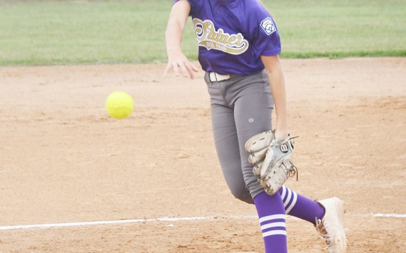 Taylor Kocian throws a pitch during Monday evening’s game against Hallettsville. Kocian struck out eight batters in the game, which ended in a 3-2 Hallettsville win. Photo by Mark Lube.