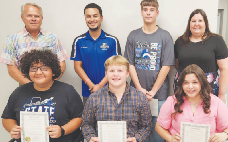 Pictured in the front row from left to right are Rafael Quilpas, River Bergman, and Delanie Dominguez. Pictured in the back row from left to right are Yoakum ISD School Board President Glen Kusak, Yoakum High School Band Director Aaron Villarreal, Dylan Shimek, and Yoakum High School Band Director Lacy Orsak.