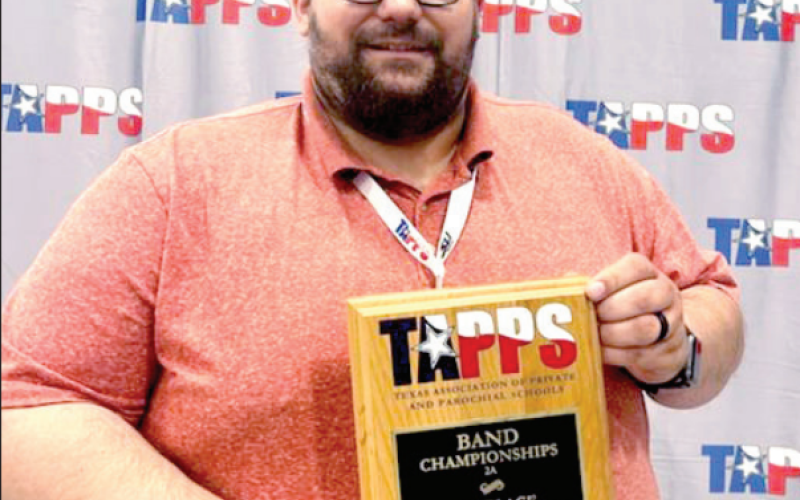 Jake Heck, band director at both Shiner St. Paul and Hallettsville Sacred Hearts Catholic School, brought home to 2022-23 Fine Arts Director of the Year Award