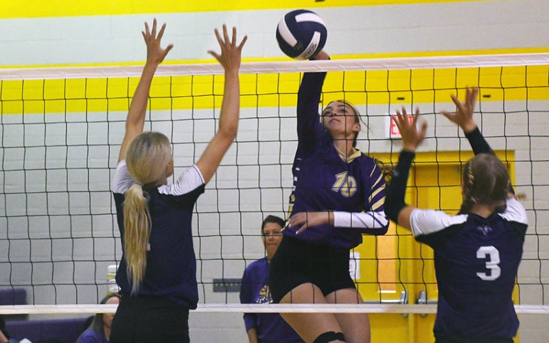 Stockdale tries to block an attack attempt by Chelsea Whiddon Friday morning in the Shiner Tournament. The Lady Comanches beat Stockdale in two sets. Photo by Mark Lube.