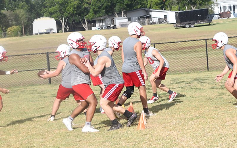 The Cardinals football team run a play during practice on Aug.2. St. Paul will scrimmage at Nixon this week and at Weimar next week before opening at Flatonia on Aug. 25. Photo by Mark Lube.
