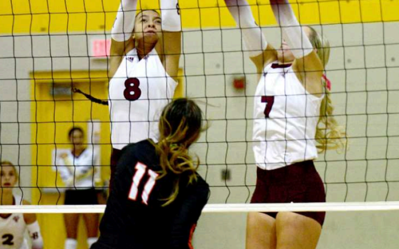 Kasey Harper (8) and Ella Amsden (7) vs. Gonzales Friday morning. Ella was named to the all-tournament team. Chuck Grafe/Tribune-Herald