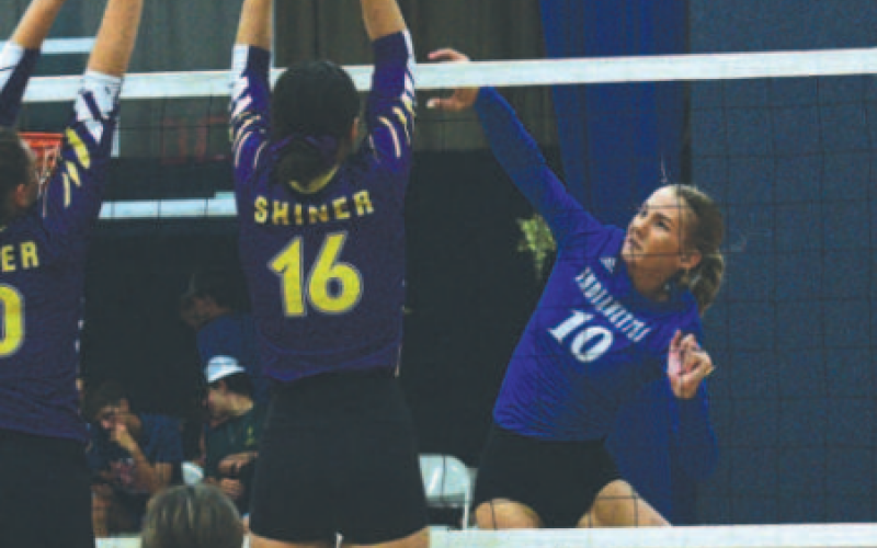 Rylan Dworsky attacks vs. Shiner. Chuck Grafe/Tribune-Herald