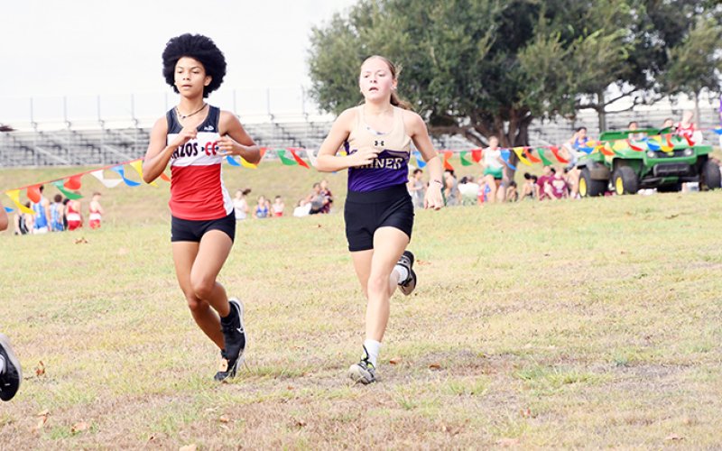 Emma Joslin placed No. 14 with a time of 13 minutes, 48.6 seconds Saturday at the Shiner meet. Photo by Mark Lube.