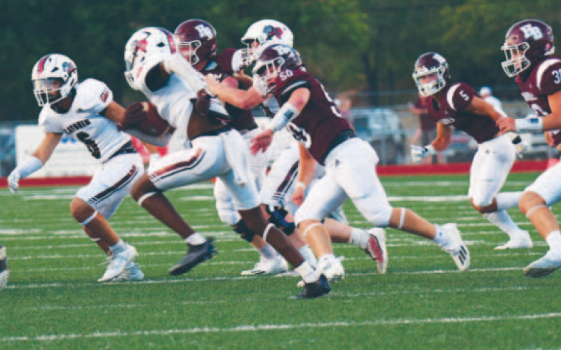 Brahma linebacker Dawson Smith chases down Flatonia’s Keegan Green in the first period. Chuck Grafe/Tribune-Herald