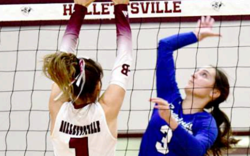 LB Kenedy Wood (1) and Edna’s Megan Callaway at the net. Chuck Grafe/Tribune-Herald