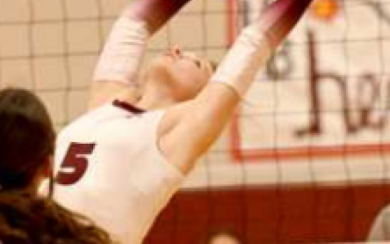 Anna Steffek sets vs. Industrial Chuck Grafe/Tribune-Herald