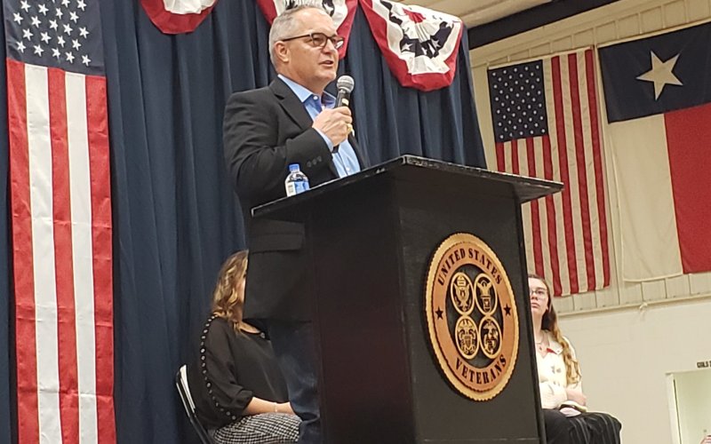 Steven Greenwell speaks at the 2022 Veterans Day Services held in his hometown of Moulton, on his time as a U.S. Marine and later, as a special agent with the state department's Homeland Security. he was honored Monday by the U.S. Attorney's Office for one of the last cases he cleared before retiring from the special investigations unit and became Lavaca County's Precinct 1 Justice of the Peace, not long thereafter. Photo by Bobby Horecka