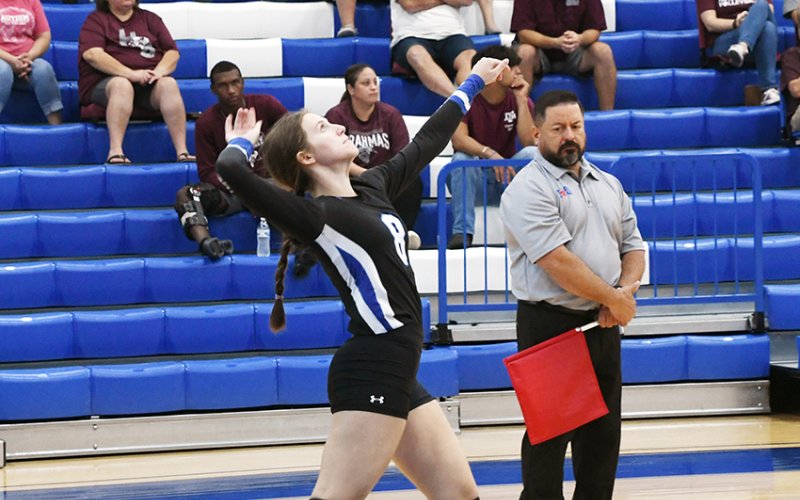 Leah Muenich scored three aces against the LBs. Photo by Mark Lube.