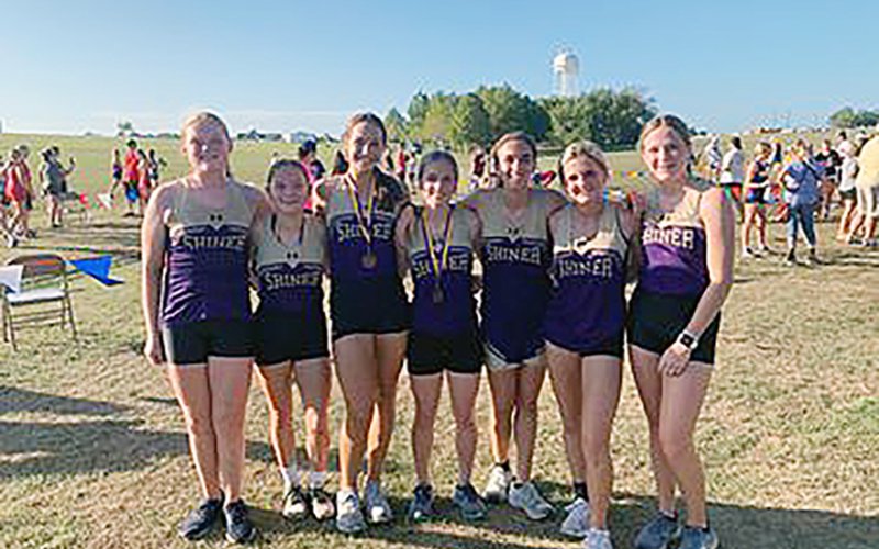 The Shiner Lady Comanches took second place. From left are Eve Roberts, Emma Joslin, Erin Pustka, Hayleigh Burns, Megan Burns, Jo Caka,  and Callie Chrismon. Photo courtesy of Michelle Winkenwerder.