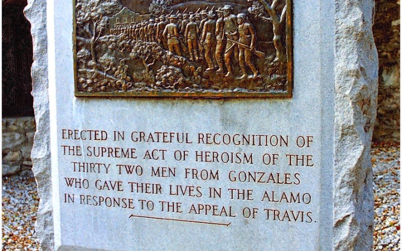 Memorial to the 32 men from Gonzales who died at the Alamo. It is located on Alamo grounds - Photo by Murray Montgomery