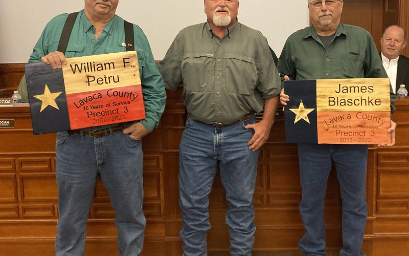 During the Friday, Dec. 22 Lavaca County Commissioners’ Court meeting, two employees for Pct. 3 were recognized for their retirement from the county. William F. Petru, a foreman for Pct. 3, has served the county for 16 years, while James Blaschke is retiring after 10 years of service. From left are Pilat, Pct. 3 commissioner Kenny Siegel and Blaschke. Photo by Jimmy Appelt