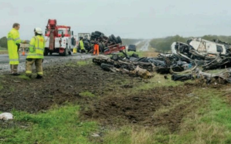 An 18-wheeler hauling a load of crushed vehicles rolled over on Interstate 10 west of Flatonia last Thursday morning. Photo by Andy Behlen/The Fayette County Record
