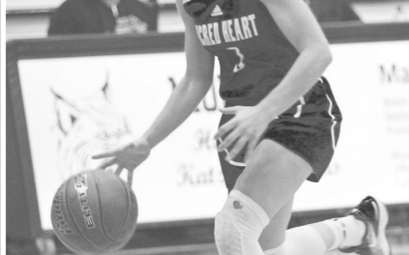 Aleigh Kraatz scored 11 points with 7 steals, 5 assists and 4 rebounds in the district-opening win Saturday. Chuck Grafe/