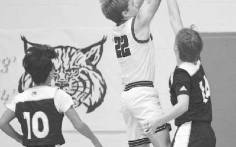 Riley Haas puts up a shot in the win over Bastrop Tribe. Chuck Grafe/Tribune-Herald