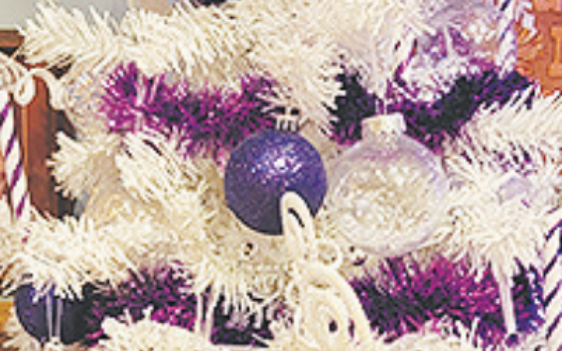 Dr. Sandra Bergey and team’s tree at the Yoakum Heritage Museum’s Christmas Tree Forest. Both of the trees are rendered with great precision expressing the theme challenge of “Reminiscing in Shades of Purple.” Contributed photo.