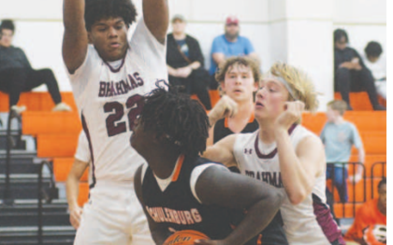 Jorian Wilson and Nathan Henke clamp down on defense in the victory over Schulenburg. Chuck Grafe/Tribune-Herald