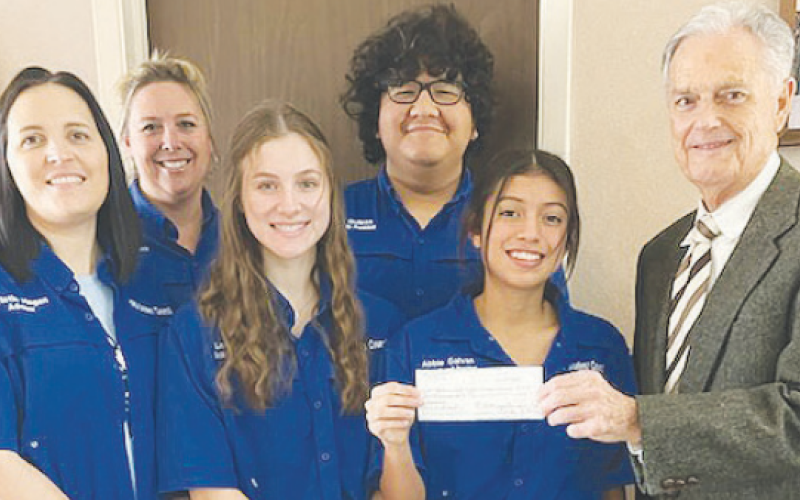 Pictured in the front row from left to right are Kristin Hagan, co-advisor, Leah Muenich, co-Energy and Environment Committee; Abbie Galvan, Student Council President and Project Leader, Garlan Weber, Kluck Foundation Director. Pictured in the back row from left to right are Amy Robbins, co-advisor of Student Council and Rafael Quilpas, Student Body President. Contributed photo.