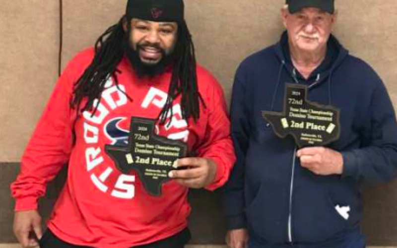 Ade Agbogun (left) and Louis Kolos finished in second place at the 72nd annual Texas State Championship Domino tournament played Sunday at the Hallettsville KC Hall. Agbogun and Kolos were defeated by Kevin Tesch and Gary Fuller in the finals that ended after midnight. The domino partners also placed second in last year’s tournament. In addition, Kolos had teamed with L.J. Judd in 1998 to win the championship. Photo by Joey Henke