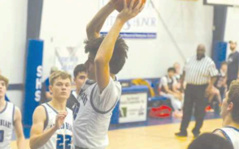 Sam Bludau rebounds in a recent home game.