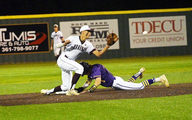 Cale Shows steals second in the first inning as second baseman Tanner Wagner takes the late throw in the Shiner baseball team game at Hallettsville on Monday night. Photo courtesy of Chuck Grafe/Hallettsville Tribune-Herald