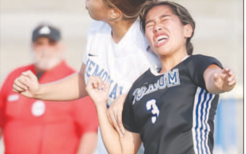 Rubi Martinez (3) gets the ball against a player. Photo courtesy of Raymond Rosas.
