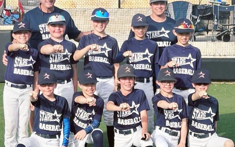 Pictured front row from the left are Holt Thigpen, Brixdon Zimmerman, Kolt McFarlin, Chans Janak, and Batboy - Brunes Davis. Second row from the left are  Ace Radicke, Evan Jahns, Bowen Davis, Joseph Martinez, and Wyatt Hopkins. Back row from the left are Coach Kerry Morgan and Coach Cole Hybner.
